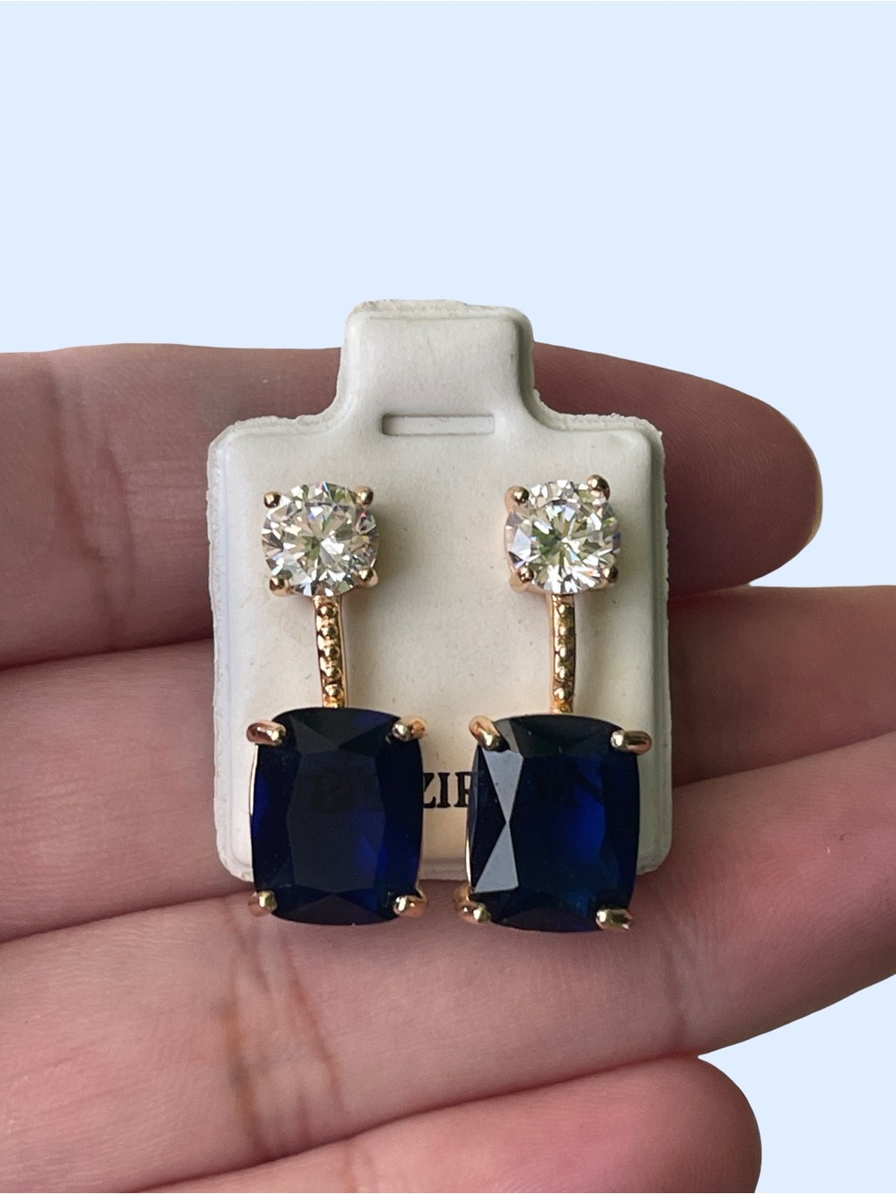 Elegant Gold Drop Earrings with Deep Blue Stones and Clear Studs